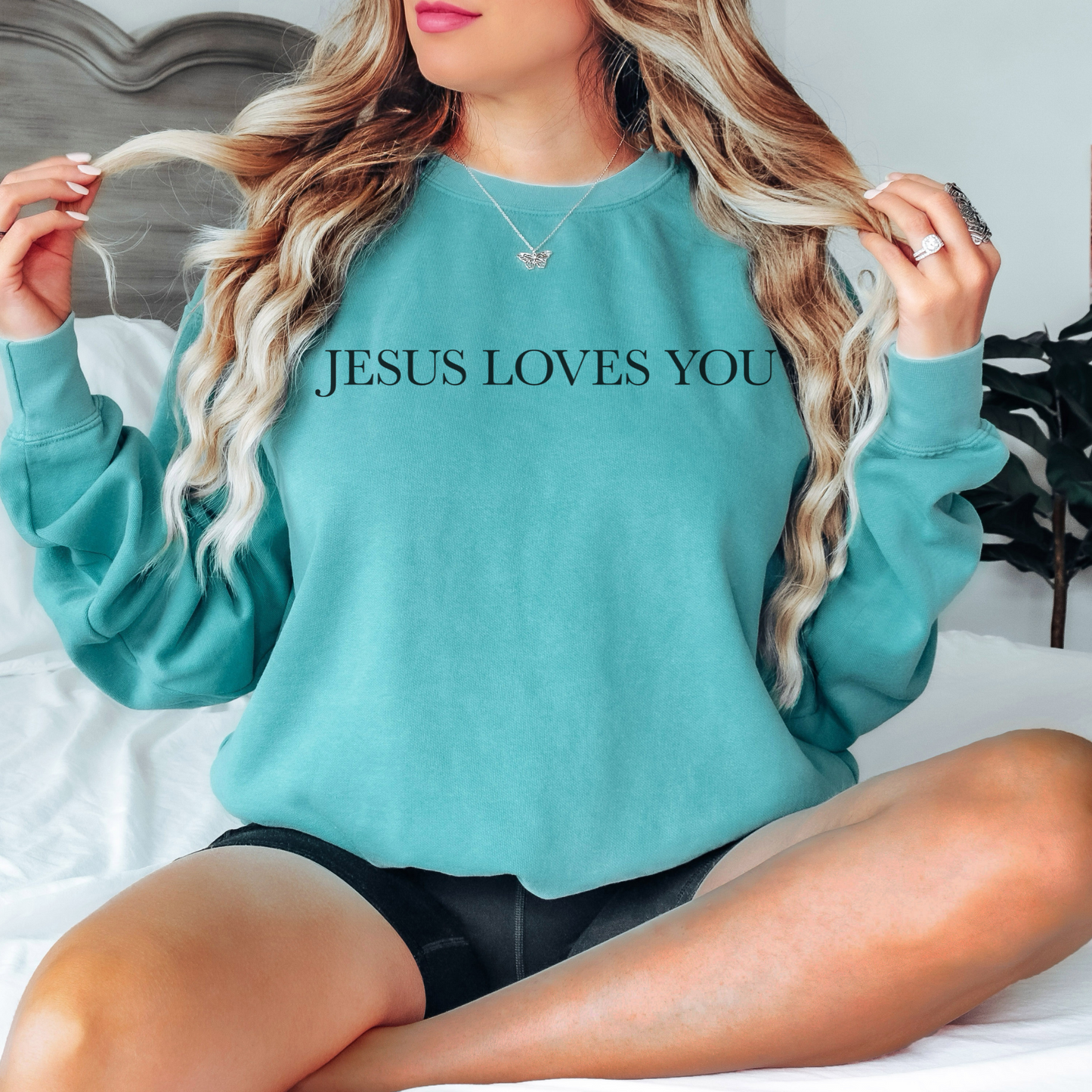 Jesus Loves you ( We Love eachother because he loved us first. John 4:19 Premium Garment-Dyed Sweatshirt - Soft, Durable, and Stylish